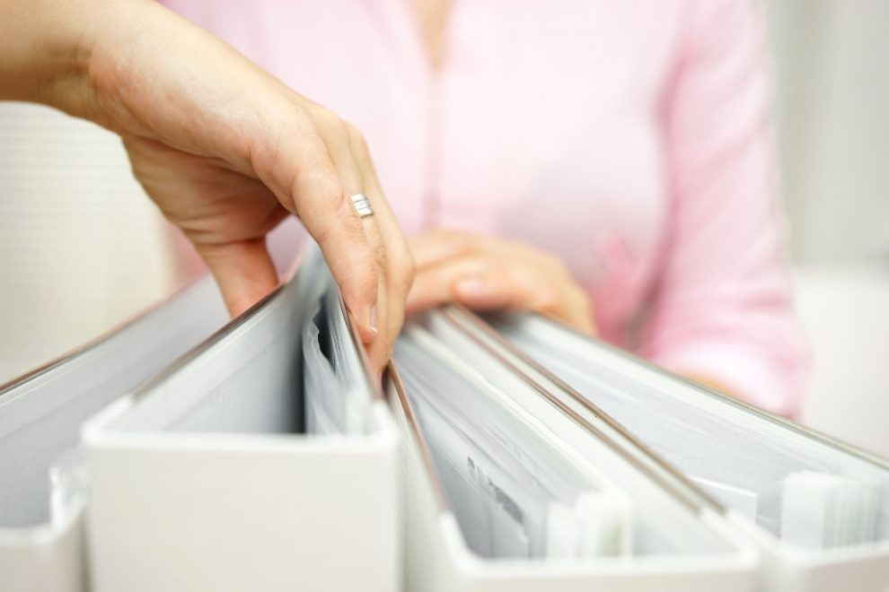 businesswoman is inspecting documentation