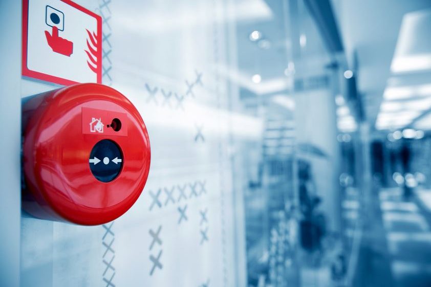20027885 – fire alarm on the wall of shopping center.