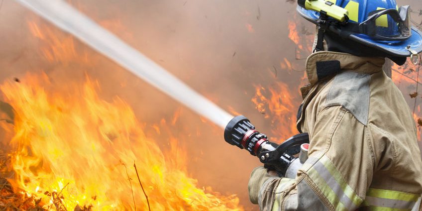 40617725 – irefighters battle a wildfire