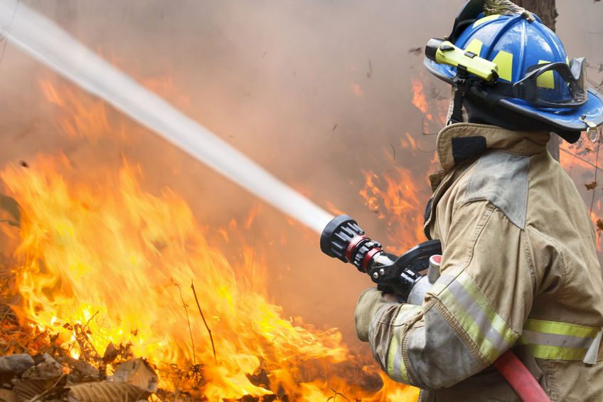 40617725 – irefighters battle a wildfire