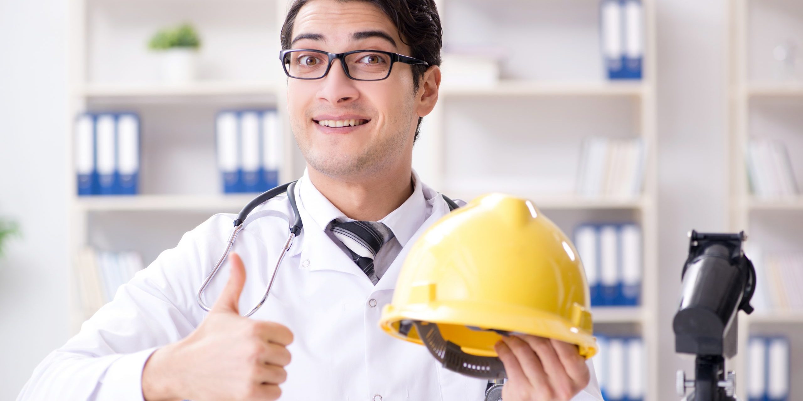 Safety doctor advising about wearing hard hat
