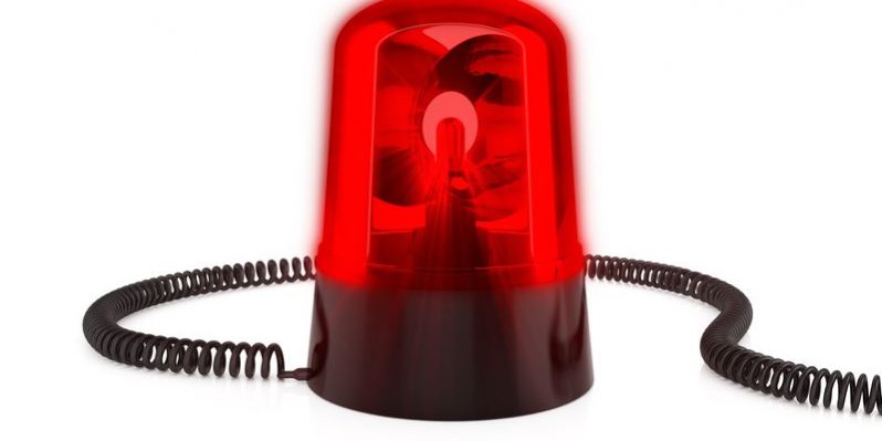 16702776 – 3d render of red flashing light on a white background