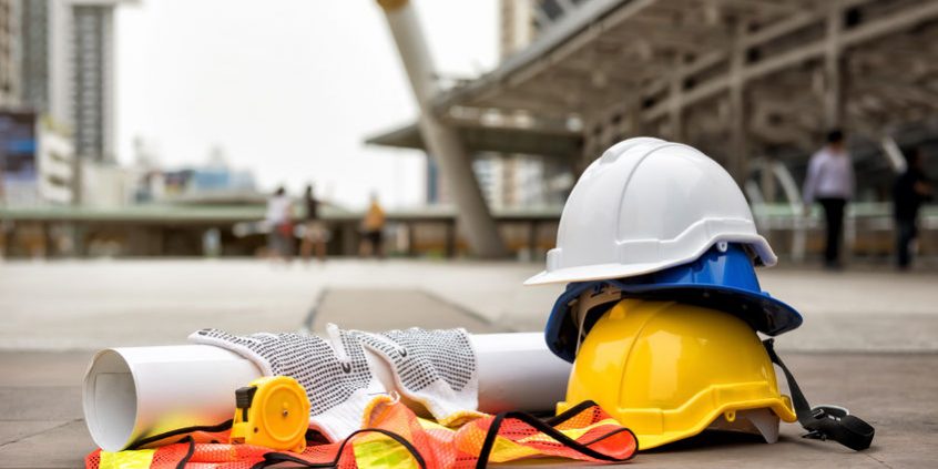 Engineer and construction equipment in city