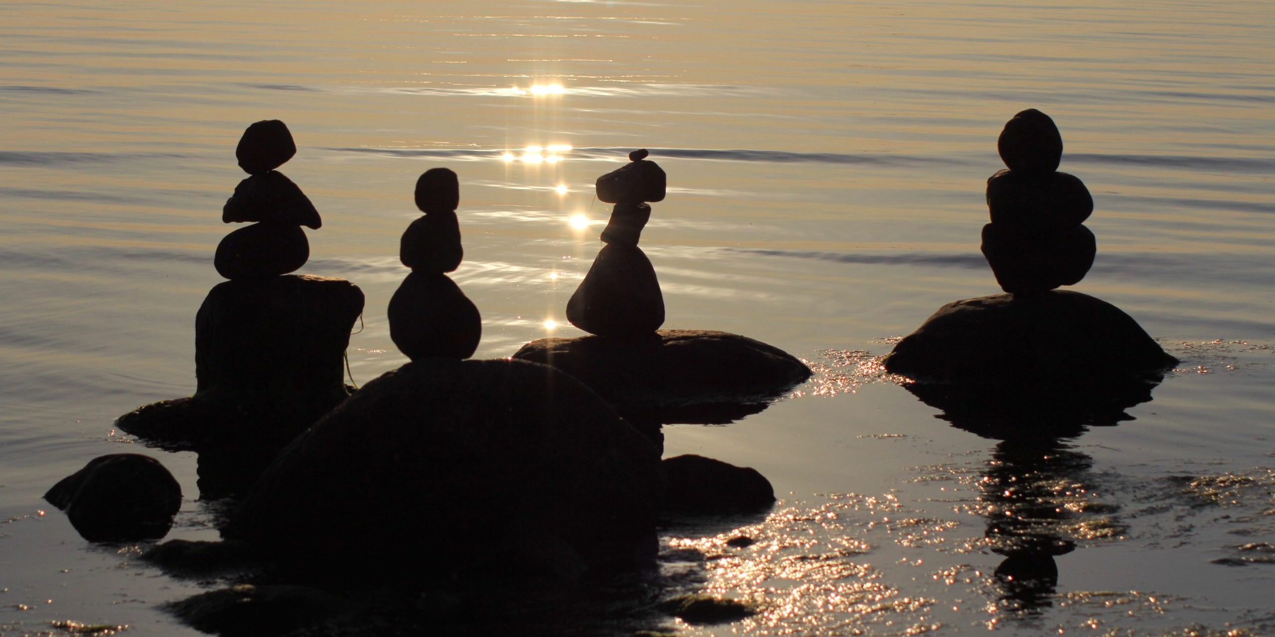 Stones,In,The,Water,Are,Stacked,In,Pyramids.,Image,On