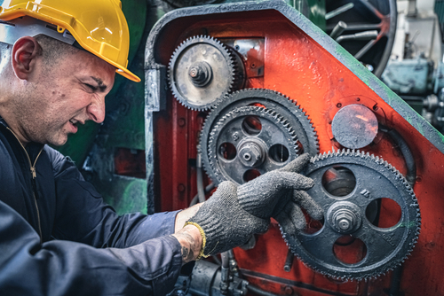 Industrial,Worker,Getting,His,Finger,Stuck,In,The,Machine.,Workplace